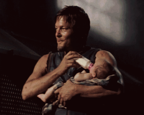 Norman Reedus Daryl Dixon holding baby GIF