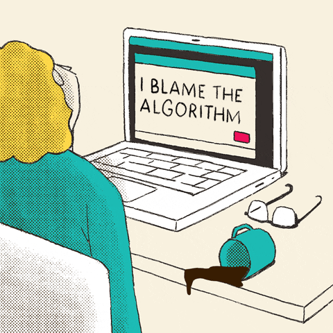 GIF of a cartoon character sitting at a desk with their laptop and a spilled cup of coffee. They are banging their head against the laptop keypad with a note that says "I BLAME THE ALGORITHM" on screen. 