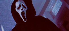gif with a character from scary movie holding a knife