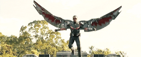 Sam Wilson aka Falcon swooping down and then folding his wings